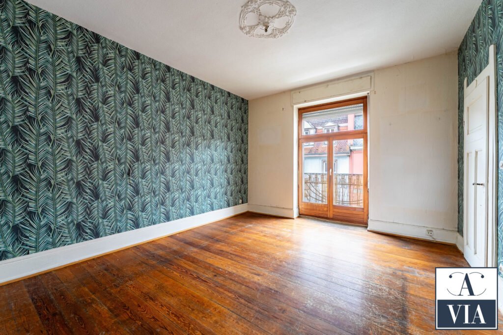 Un bel appartement 3 pièces avec un balcon situé dans le vieux Neudorf / rue de Thann